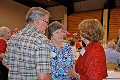 Robert Cranston, Dororthy Cranston chatting with Mary Lou Lee Mundy  '58 